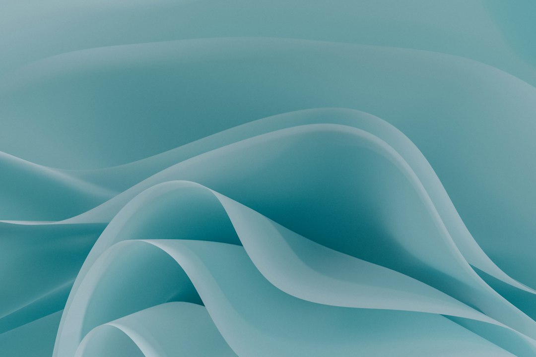 Soft teal and silver-grey abstract waves, a symbolic illustration for gradual HIFU result assessment