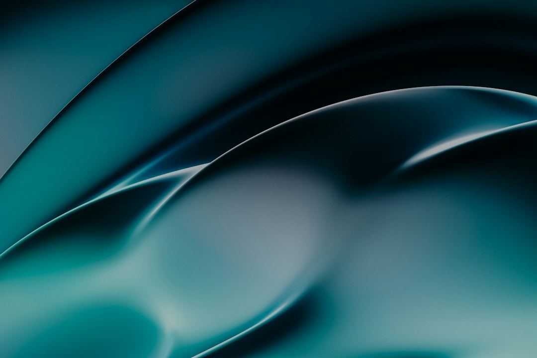Abstract teal and silver flowing lines representing strands of hair